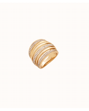 Anillo chapado en oro 18 Kt con tiras lisas y con circonitas. Ajustable para tallas de 16 a 18. El complemento perfecto para tus