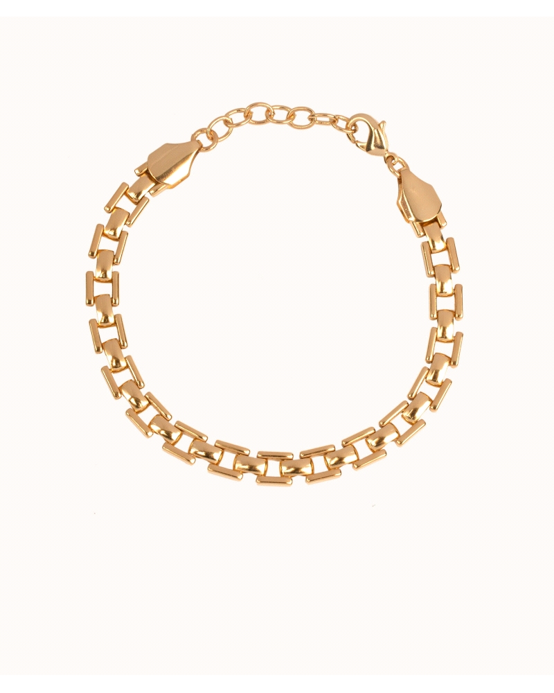 Pulsera de eslabones chapada en oro 18 Kt. Medida 17 cm + 3 cm de cadena ajustable. El complemento perfecto para cualquier día.